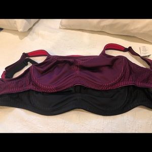 Pair of Soma sport max support underwire bras.